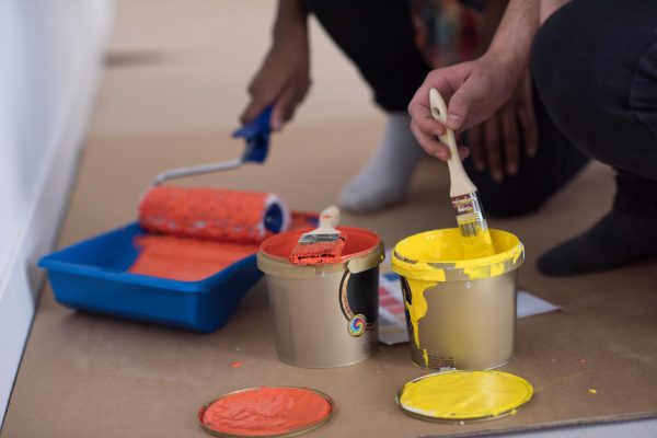 two-painters-prepare-color-painting-wall